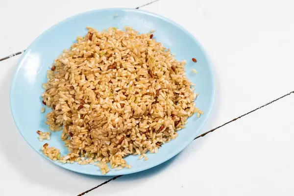 Cooked Integral Rice on the blue plate (Flip 2020)