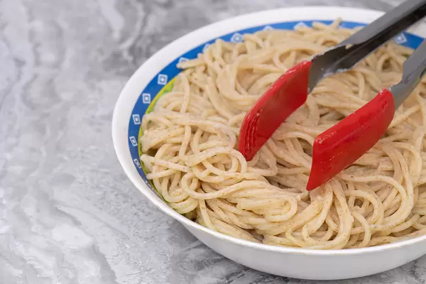 Cooked Spaghetti in the bowl with copy space