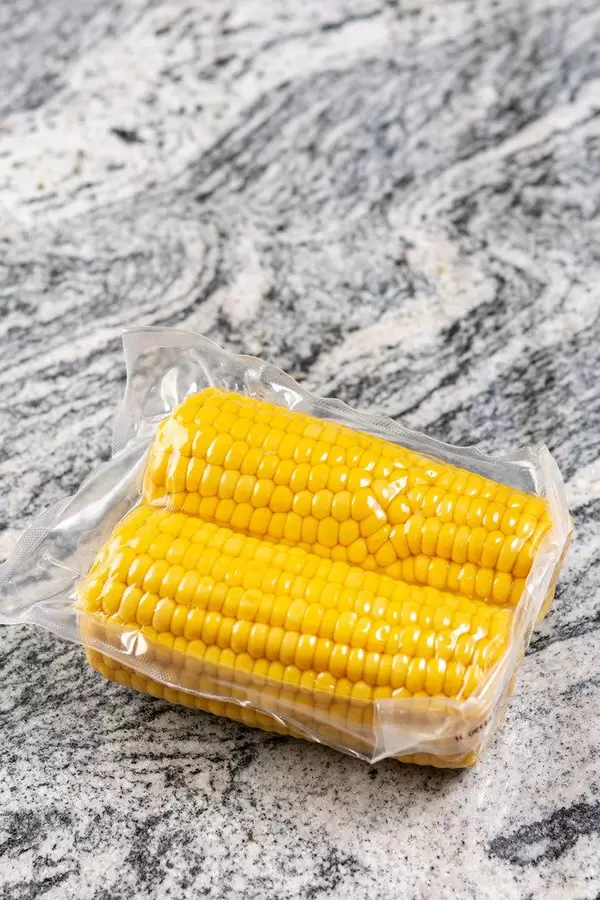 Cooked Young Corn on the grey marble (Flip 2019)