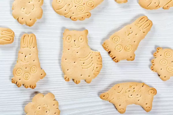 Cookies in the shape of animals on a white background. Top view