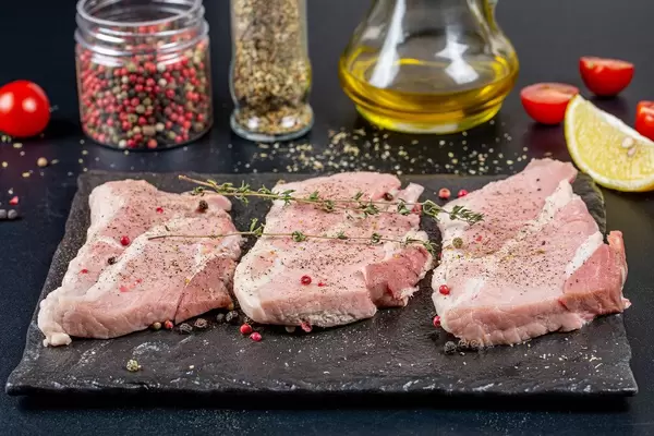 Cooking background-fresh raw steaks with spices (Flip 2020)