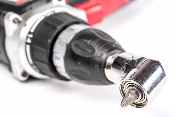 Cordless screwdriver with adapter, close-up