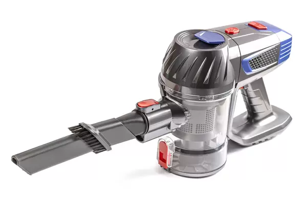 Cordless vacuum cleaner on white background