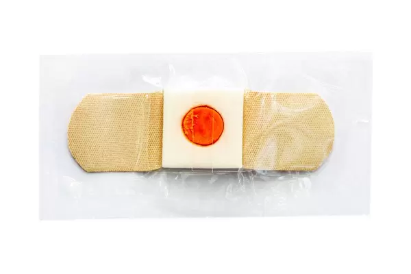 Corn remover plaster on white background