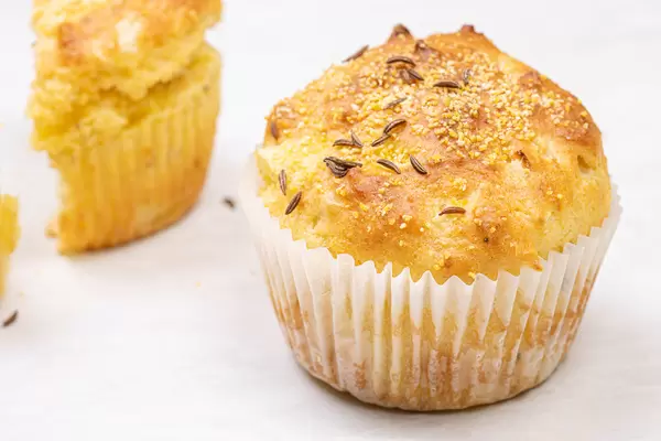 Cornbread Muffins with Cheese on the table