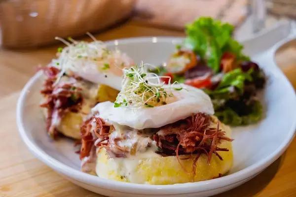 Corned beef burger meal with poached egg, bokeh shot (Flip 2019)
