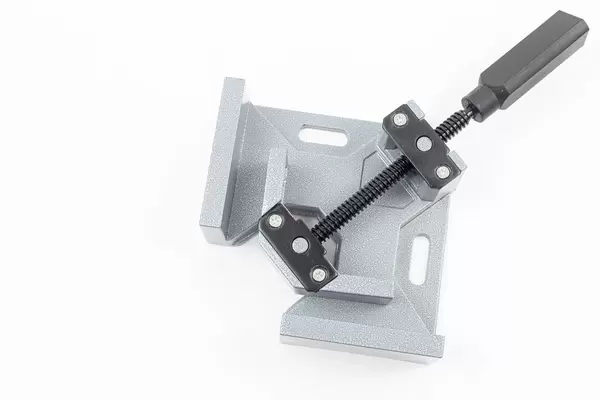 Corner clamp on white background with copy space
