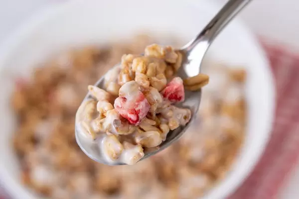 Cornflakes with Chocolate and Strawberries on the spoon (Flip 2019)