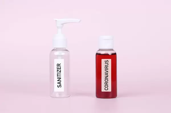Coronavirus blood sample and bottle of sanitizer
