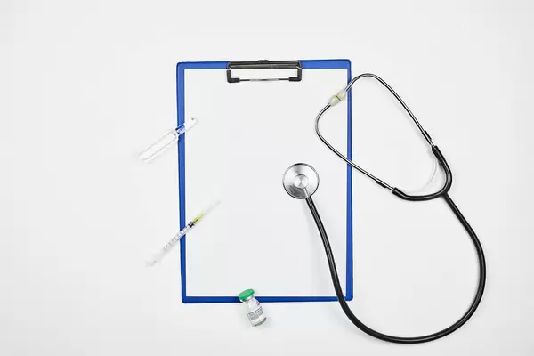 Coronavirus vaccine, syringe on the doctor's table