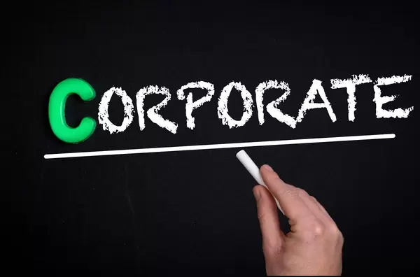 Corporate text on blackboard