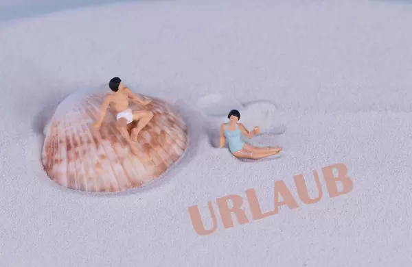 Couple relaxing at sandy beach