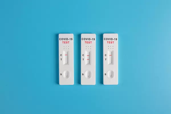 Covid-19 Antigen tests on blue background