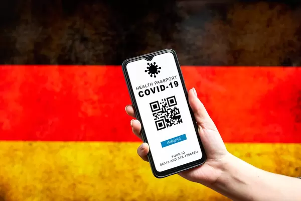 COVID-19 health passport app against Germany flag