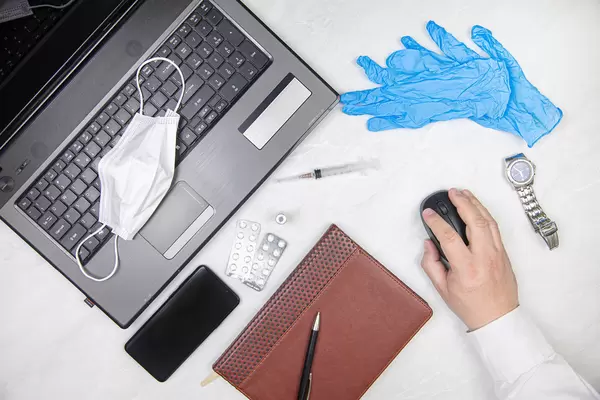 Covid-19 vaccination plan concept with doctor and lap top