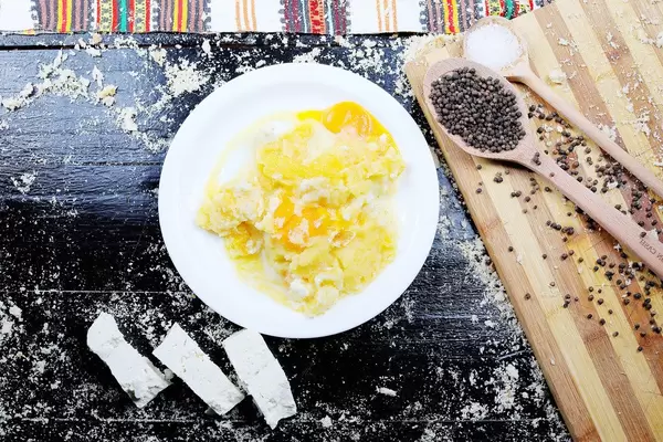 Creamy cheesy polenta, traditional dis, black background (Flip 2019)