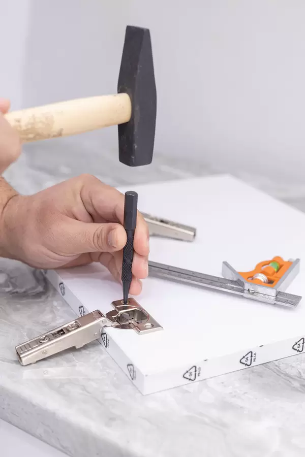 Creating Holes for Screws on the Hinges