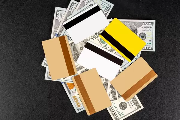 Credit cards and dollars in cash