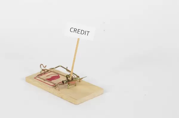 Credit sign on mouse trap