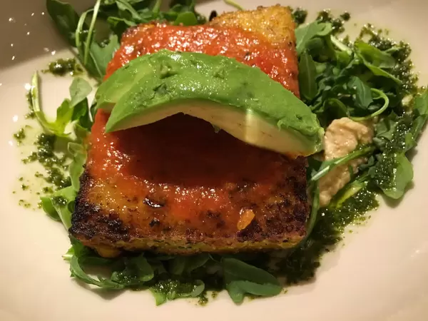 Crispy Quinoa Cake with Humus, Avocado and Tomato