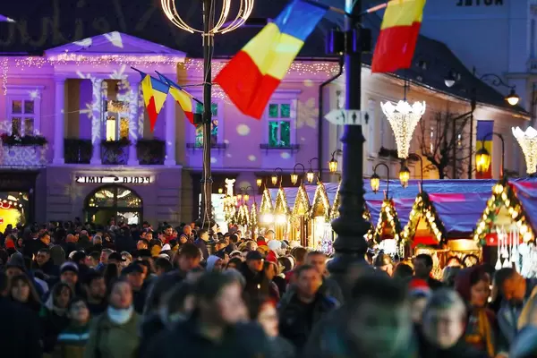 Crowded Christmas market in Sibiu, Romania, night view (Flip 2019)