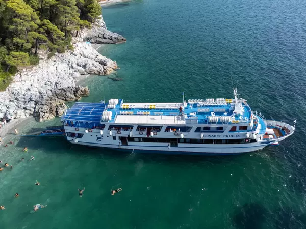 Cruise ship makes a stop at Kastani beach, famous thanks to movie Mamma Mia!, on Skopelos