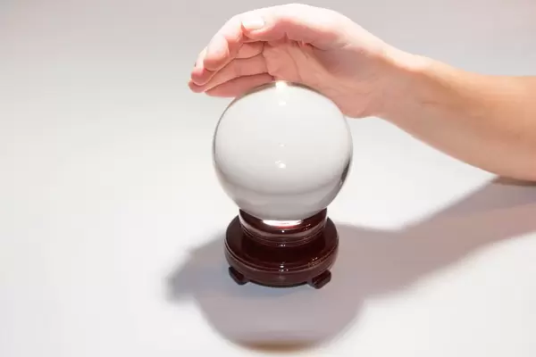 Crystal ball and hand