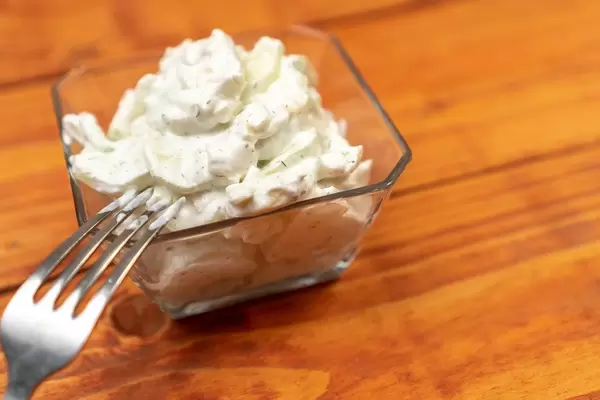 Cucumber Salad mixed with Onions and Sour Cream (Flip 2020)