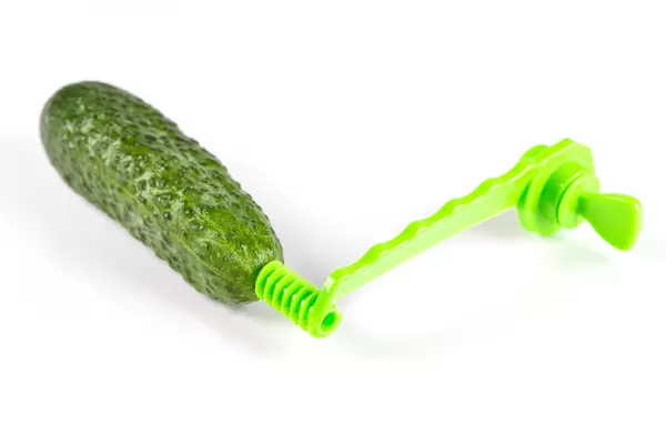 Cucumber with a spiral plastic knife