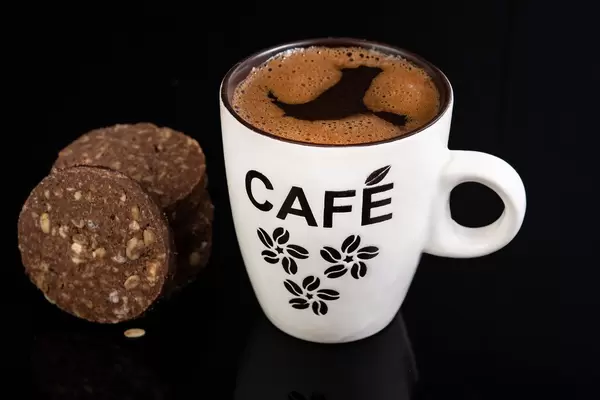Cup of Black Coffee with Choco Biscuit with Peanuts