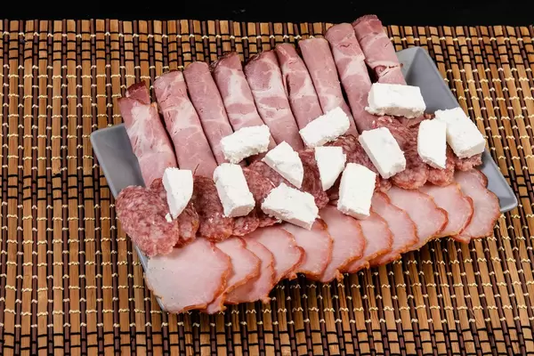 Cured Meat products served and arranged on the plate