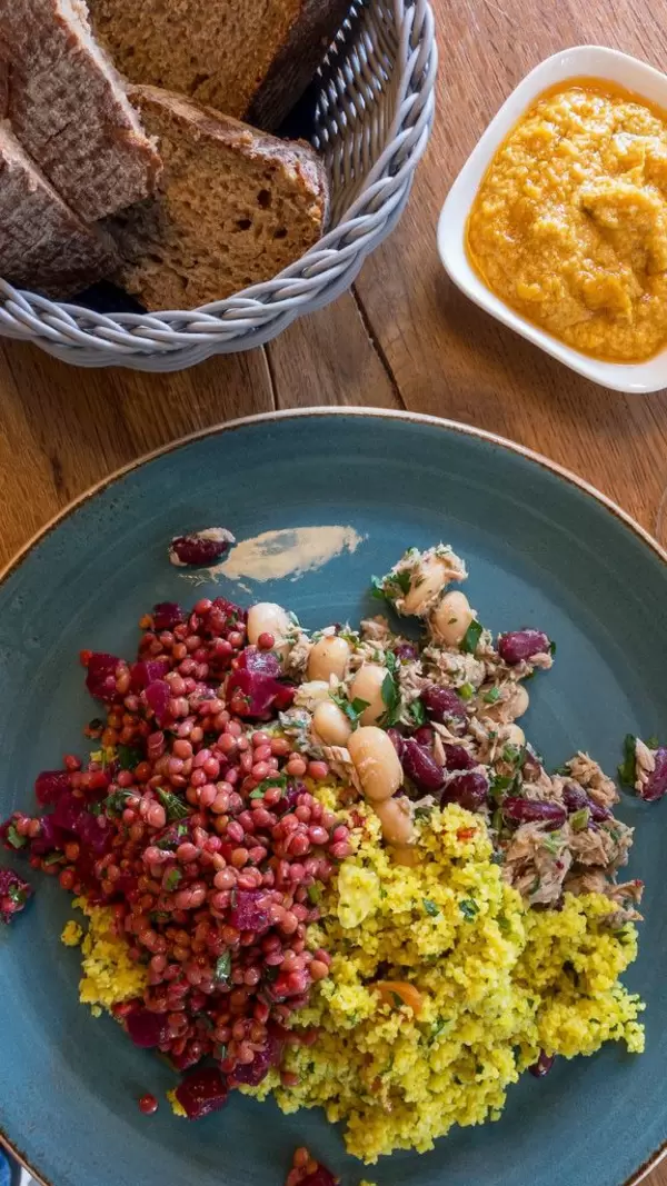 Curry Couscous, beetroot, beans and tuna with yellow hummus and bread