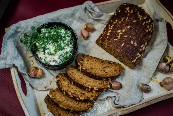 Dark Bread Slices With Cream And Garlic