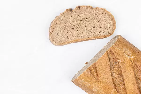 Dark bread with unleavened dough on the table with copy space