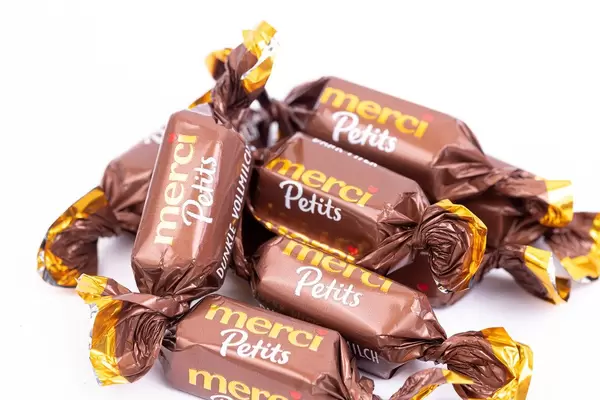 Dark Chocolate Candies in the Merci Petit paper