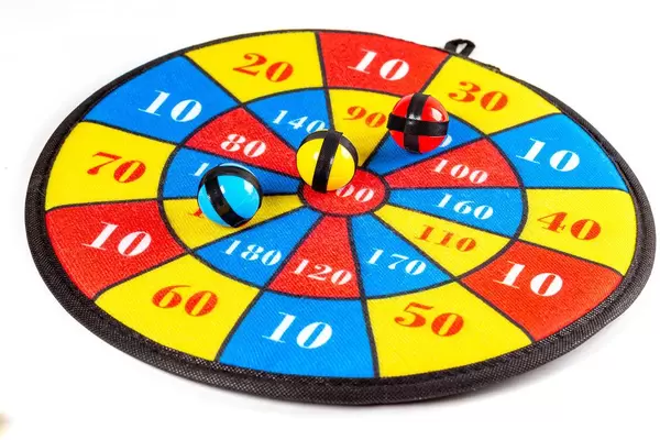 Darts and balls Velcro on white background