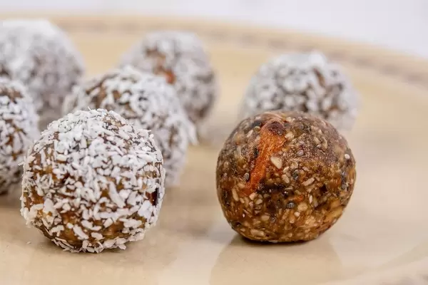 Dates and Peanut Butter energy balls cookies on the plate