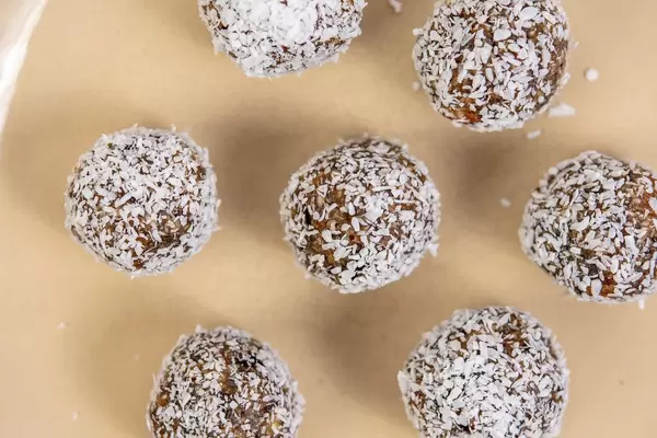 Dates and Peanut Butter energy balls in the Coconut