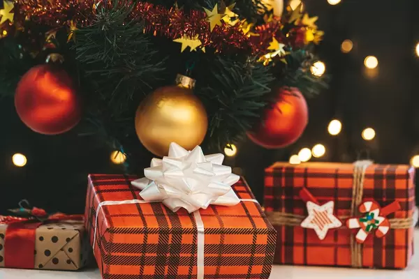 Decorated Christmas tree with beautiful gift boxes