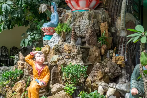Decorations with Buddhist Statues at a Pagoda in Vietnam