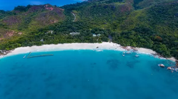 Deep blue water and an amazing beach in Grand'Anse Praslin, Seychelles - aerial photography