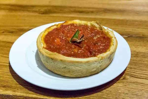 Deep Dish Pizza: The Chicago version of Pizza