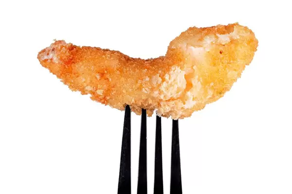Deep fried breaded shrimp on fork