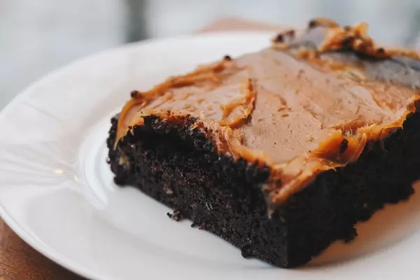 Delicious brownie with caramel close up