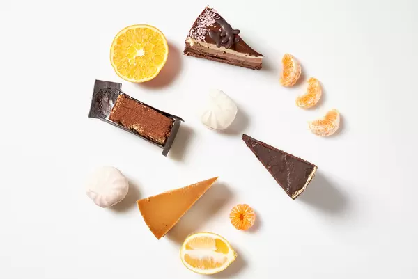Delicious cakes with lemon, orange and mandarin fruit slices