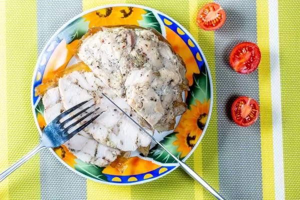 Delicious homemade chicken ham with Cutlery