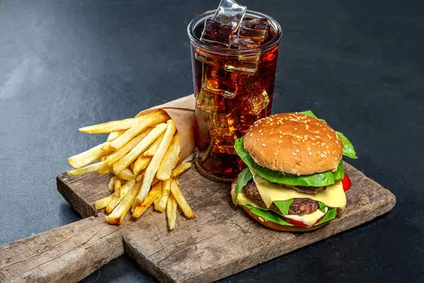 Delicious junk food-Burger, iced drink and fries