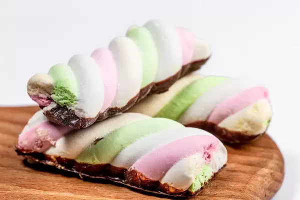 Delicious marshmallow candies on the kitchen Board (Flip 2019)