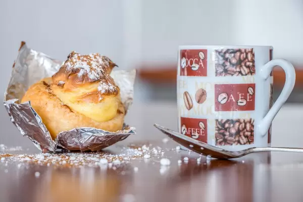 Delicious self-made pastel de nata and coffee