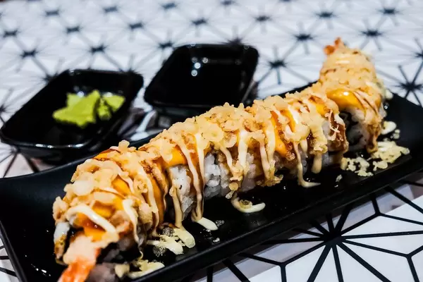 Delicious shrimp sushi served with wasabi (Flip 2019)